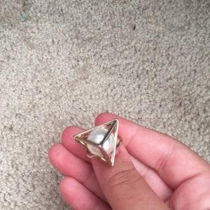 A ring that is white and gold